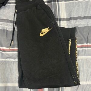 Women’s Nike Black and Gold Sweatpants!
